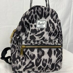NWOT Herschel mini backpack in black and grey leopard print.